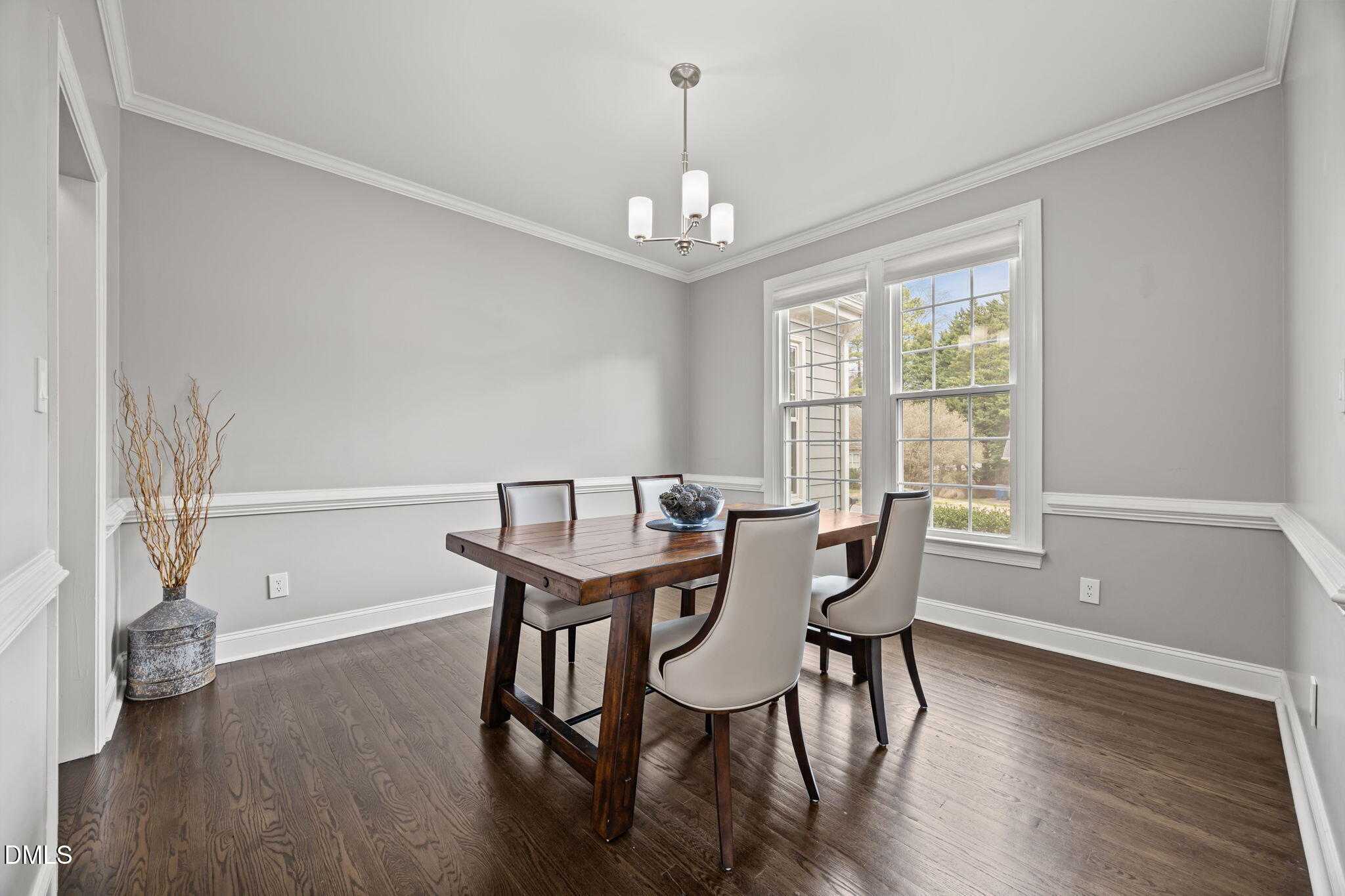 6313 Ashley Ridge Drive Raleigh, NC 27612 - Photo 4 of 41 a view of a dining room with furniture window and wooden floor