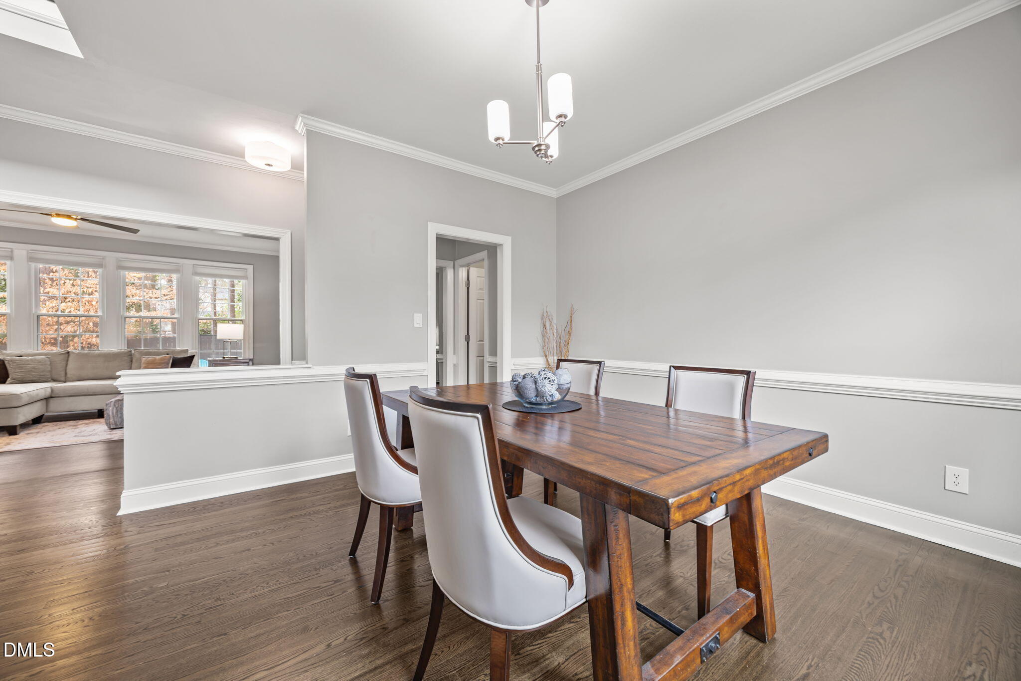 6313 Ashley Ridge Drive Raleigh, NC 27612 - Photo 5 of 41 a view of a dining room with furniture and wooden floor