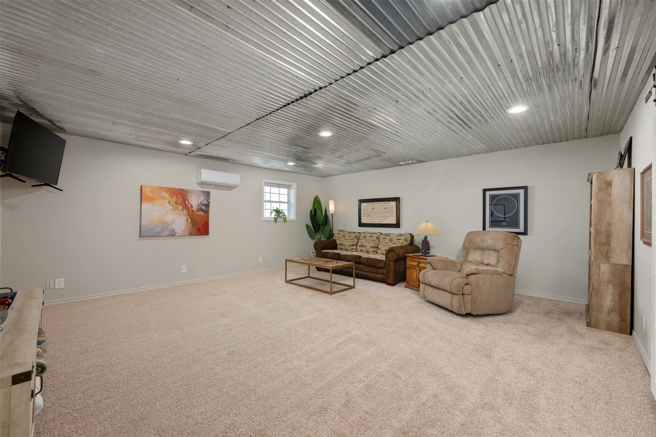 6501 County Road 239 Jarrell, TX 76537 - Photo 24 of 40 Living room featuring light colored carpet and recessed lighting
