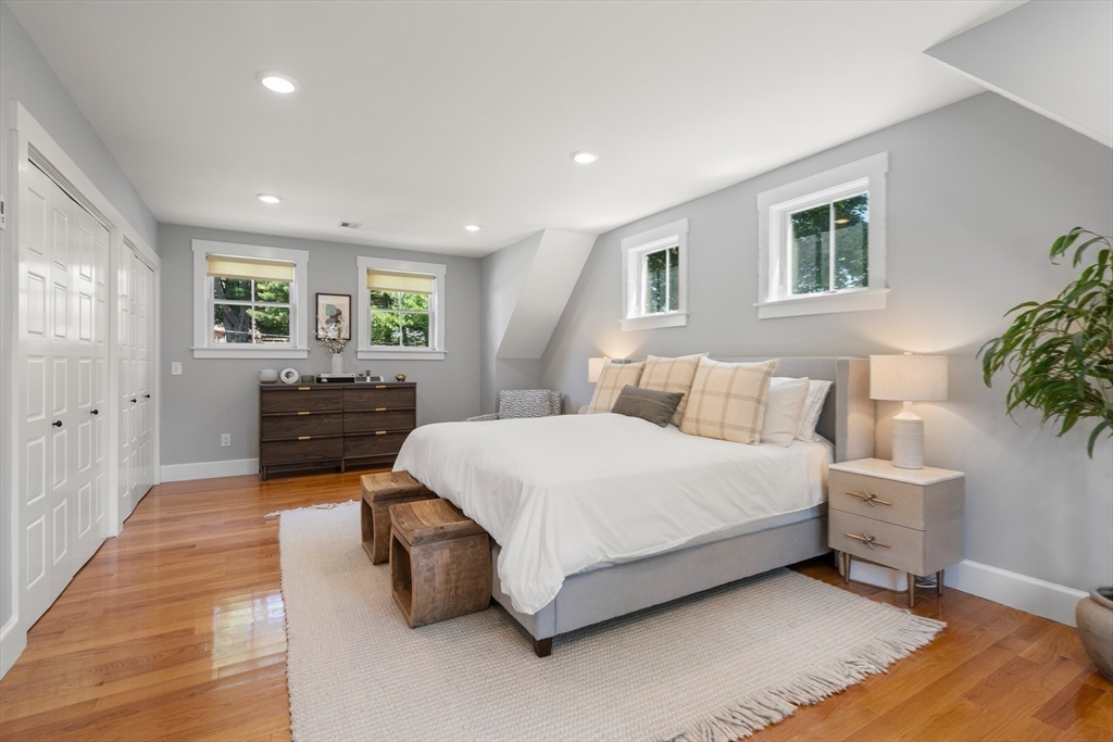 36 Autumn Circle Canton, MA 02021 - Photo 18 of 32 a spacious bedroom with a bed and a couch