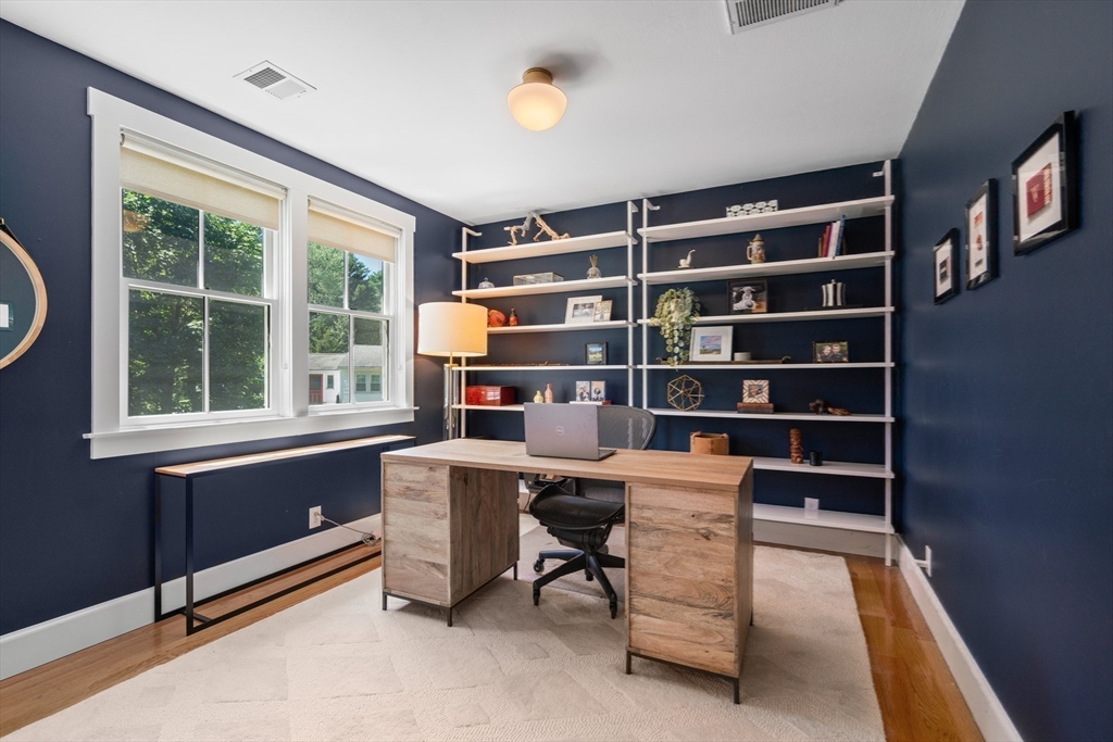 36 Autumn Circle Canton, MA 02021 - Photo 19 of 32 a view of a workspace with furniture and a window