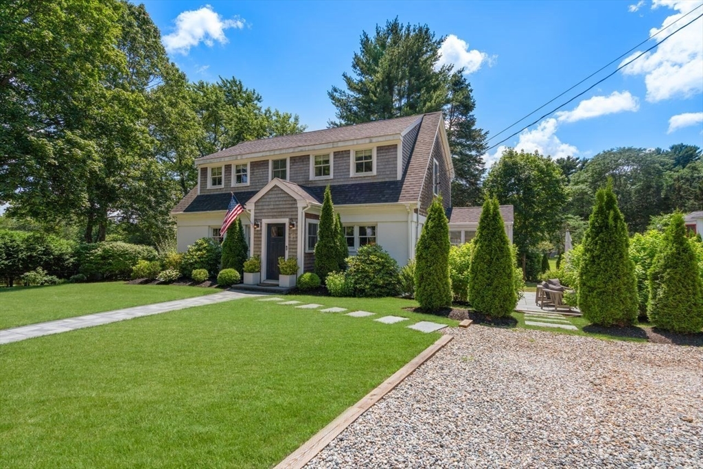 36 Autumn Circle Canton, MA 02021 - Photo 2 of 32 a front view of a house with garden