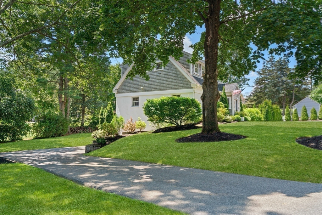 36 Autumn Circle Canton, MA 02021 - Photo 29 of 32 a front view of a house with a yard