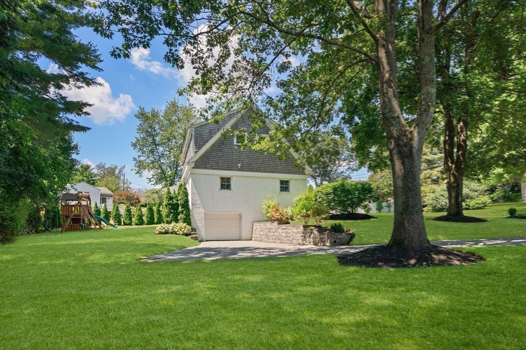 36 Autumn Circle Canton, MA 02021 - Photo 30 of 32 a view of a house with backyard