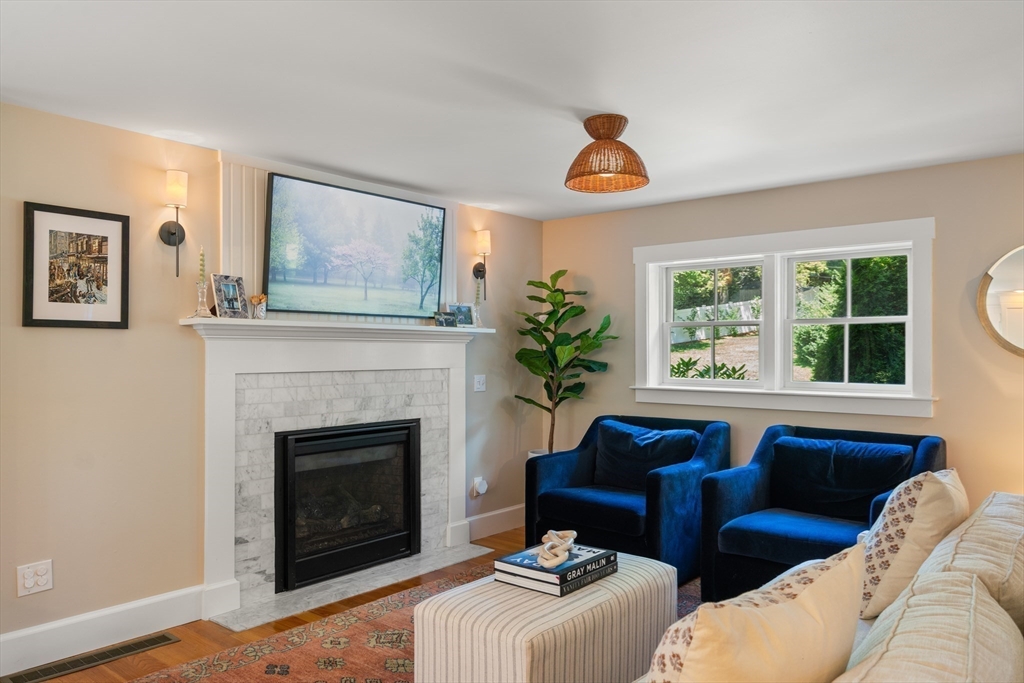 36 Autumn Circle Canton, MA 02021 - Photo 8 of 32 a living room with furniture and a fireplace