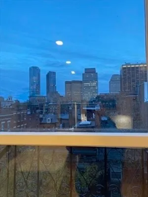 a view of a swimming pool with an outdoor space