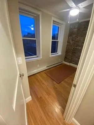 a view of outdoor space with wooden floor and staircase
