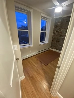 37 Garden Boston Ma, Unit 10 Boston, MA 02114 - Photo 7 of 10 a view of outdoor space with wooden floor and staircase