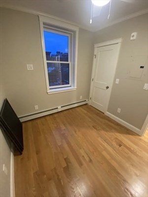 37 Garden Boston Ma, Unit 10 Boston, MA 02114 - Photo 8 of 10 a view of an empty room with a window