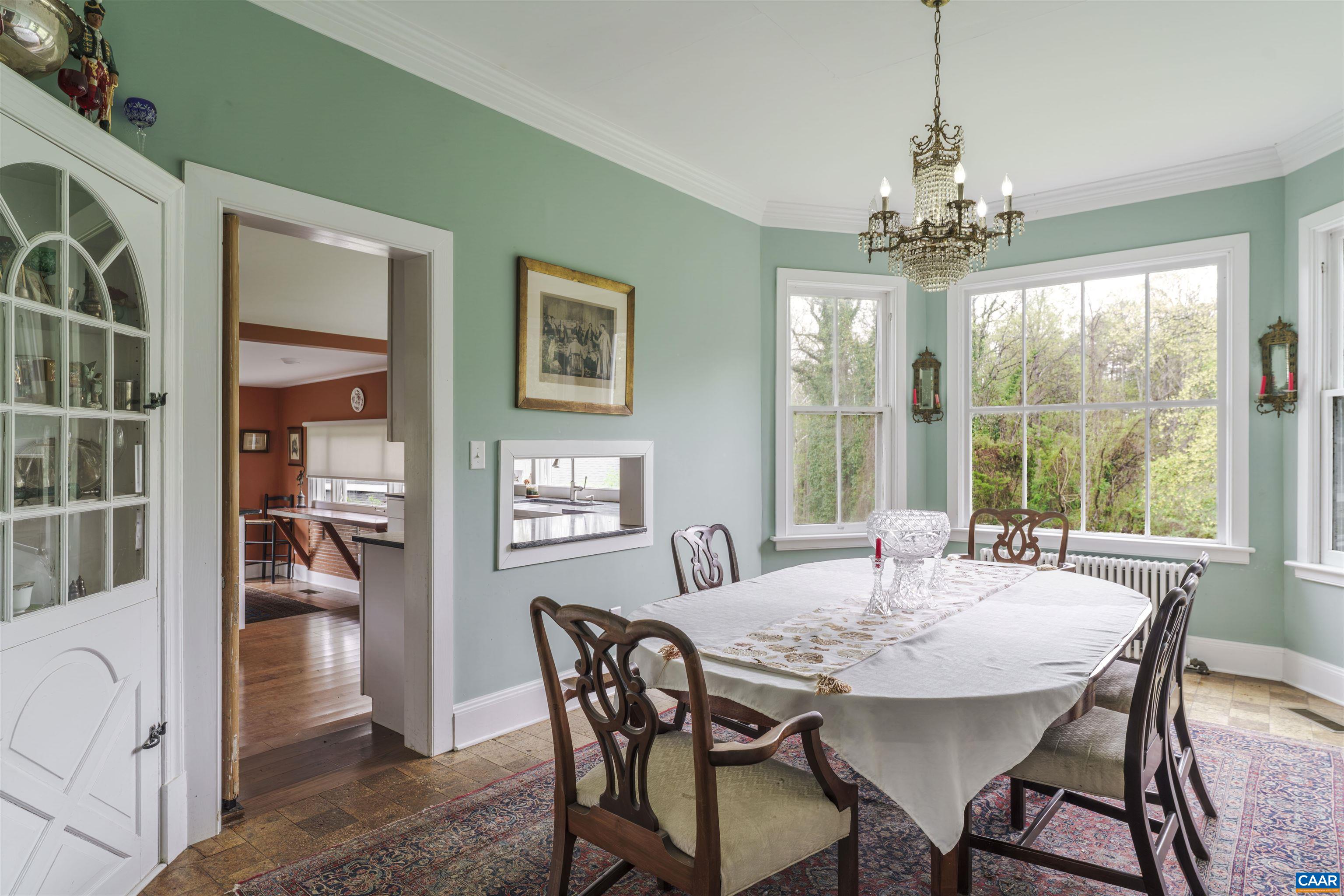 5515 Gordonsville Road Keswick, VA 22947 - Photo 12 of 46 a view of a dining room with furniture window and outside view