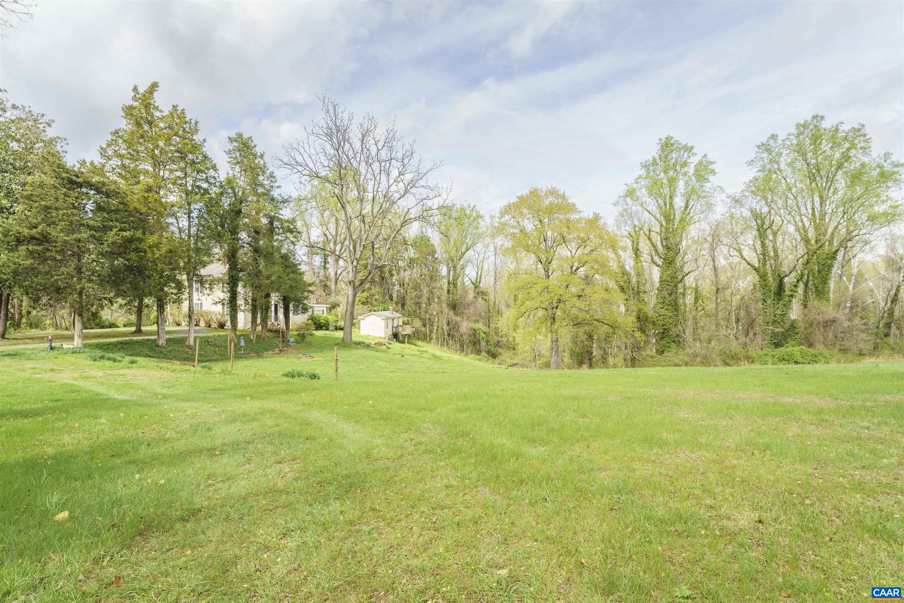 5515 Gordonsville Road Keswick, VA 22947 - Photo 2 of 46 a view of grassy field with trees