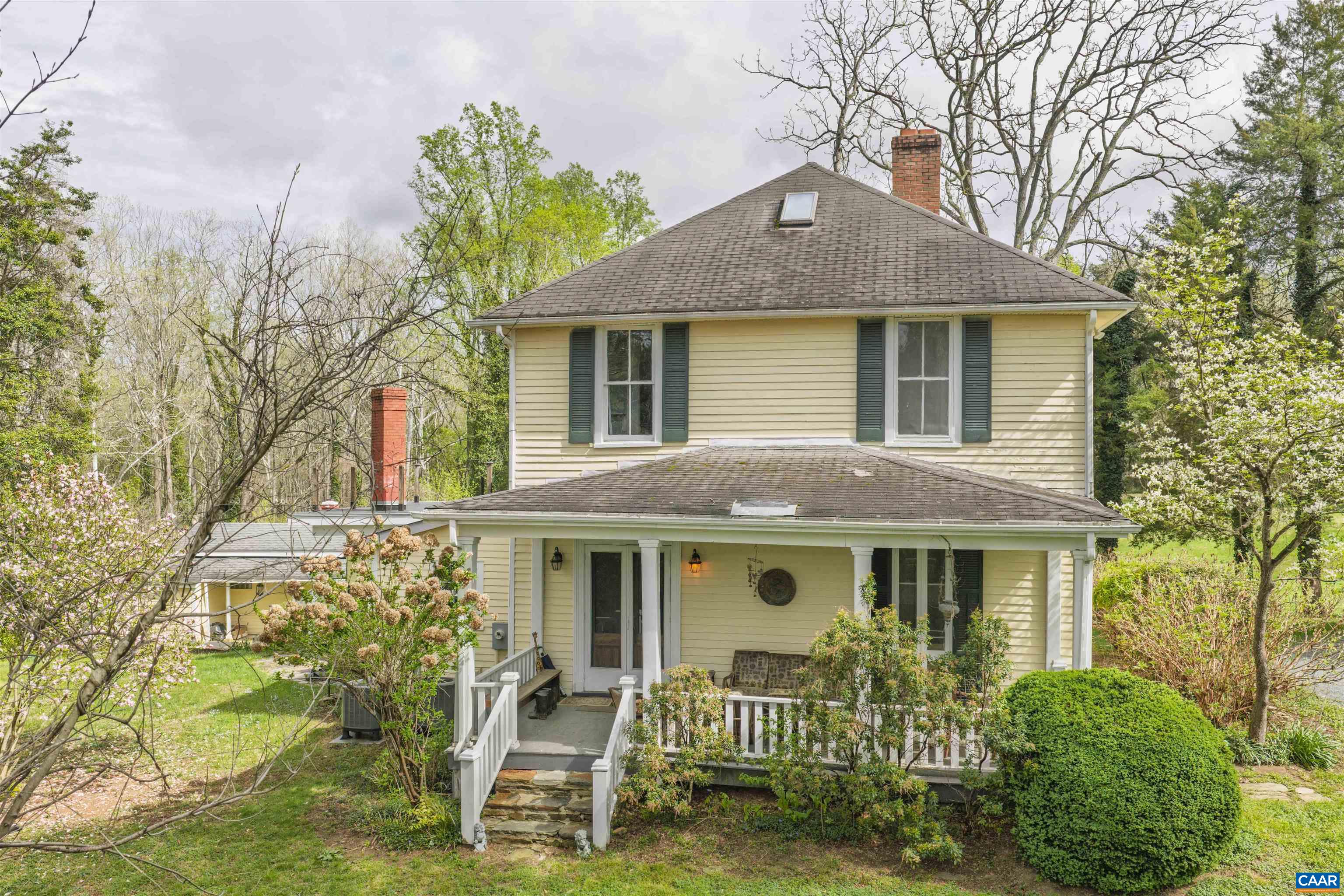 5515 Gordonsville Road Keswick, VA 22947 - Photo 35 of 46 a front view of a house with a yard