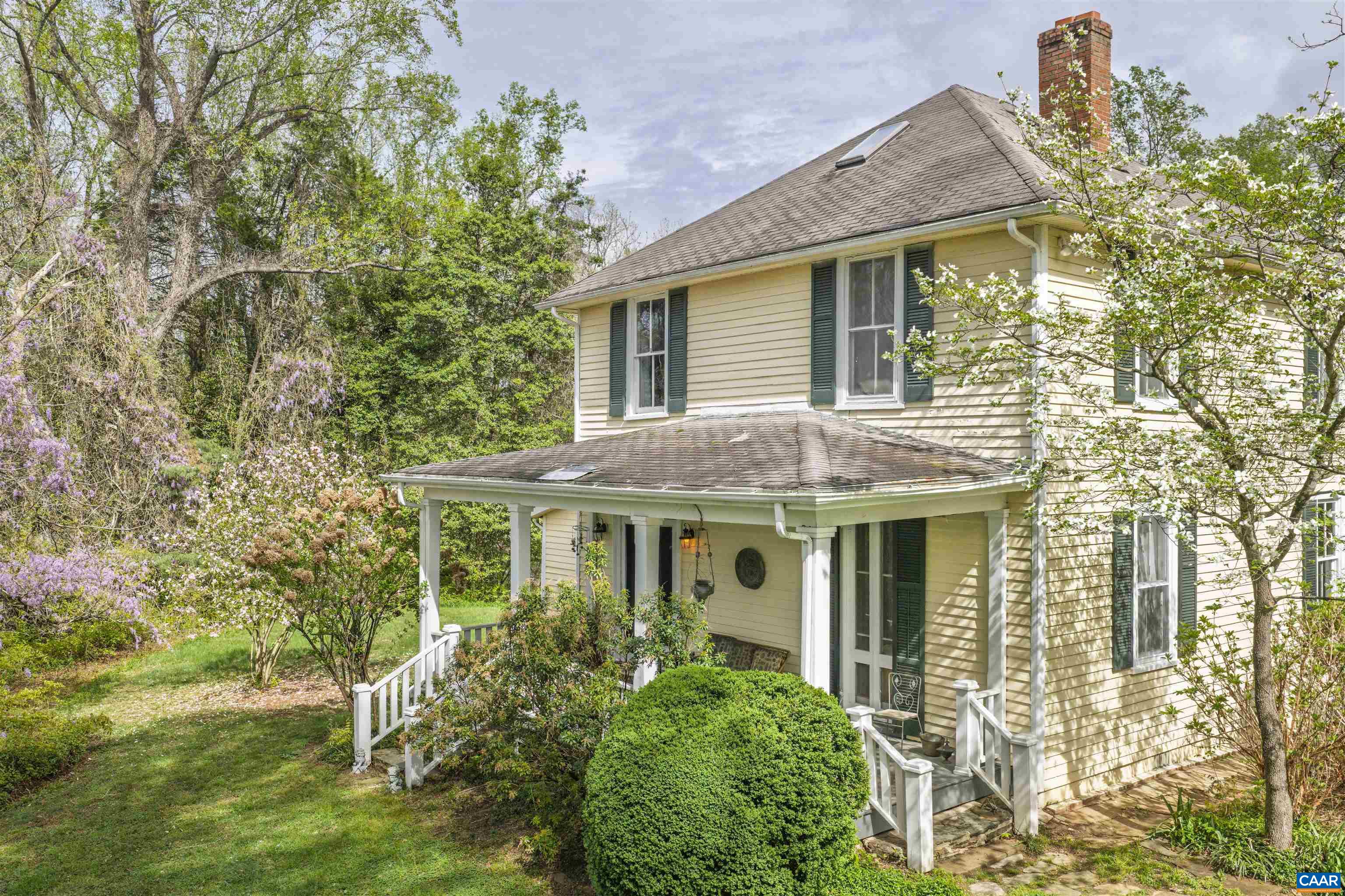 5515 Gordonsville Road Keswick, VA 22947 - Photo 36 of 46 front view of a house with a yard