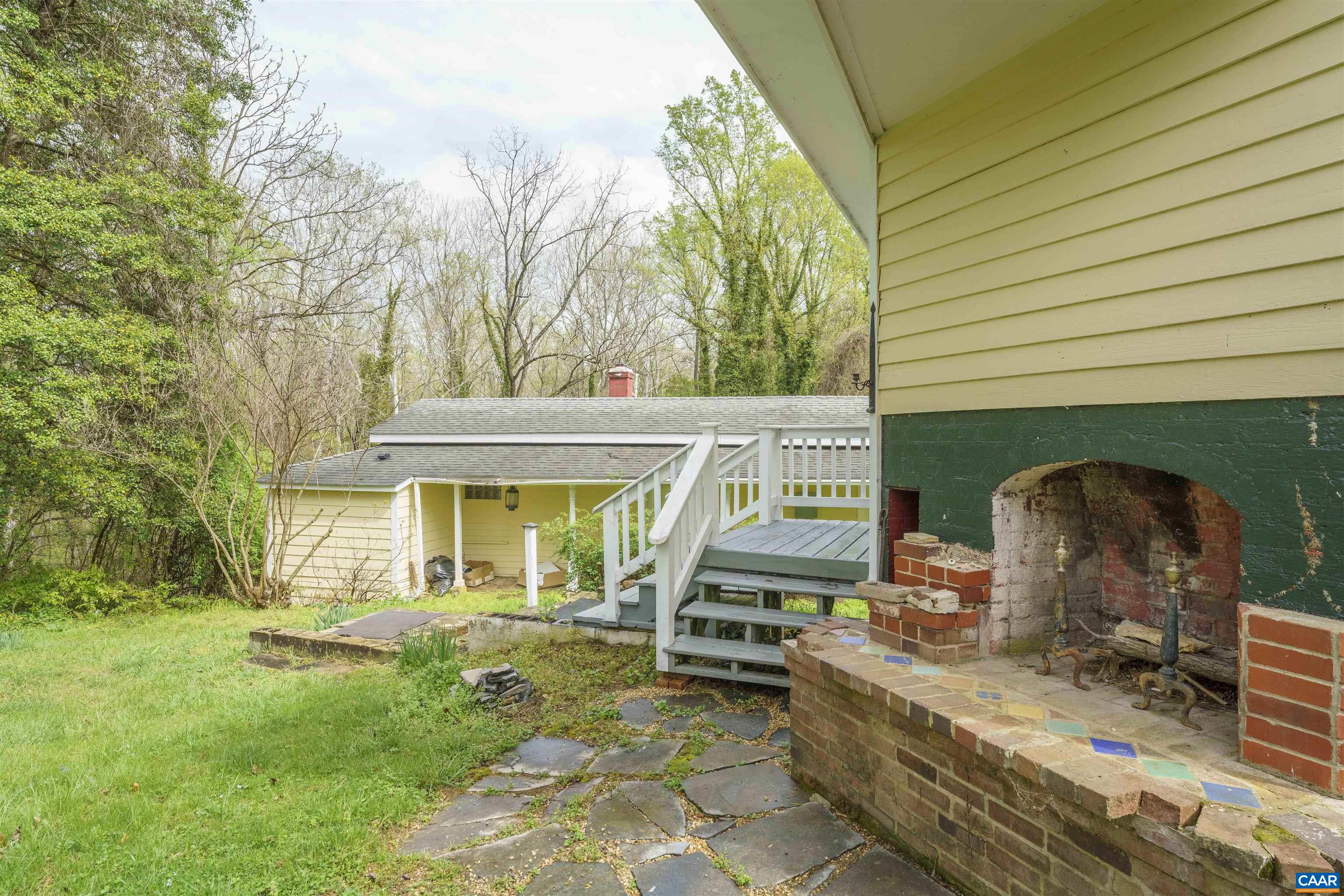 5515 Gordonsville Road Keswick, VA 22947 - Photo 37 of 46 a front view of a house with garden