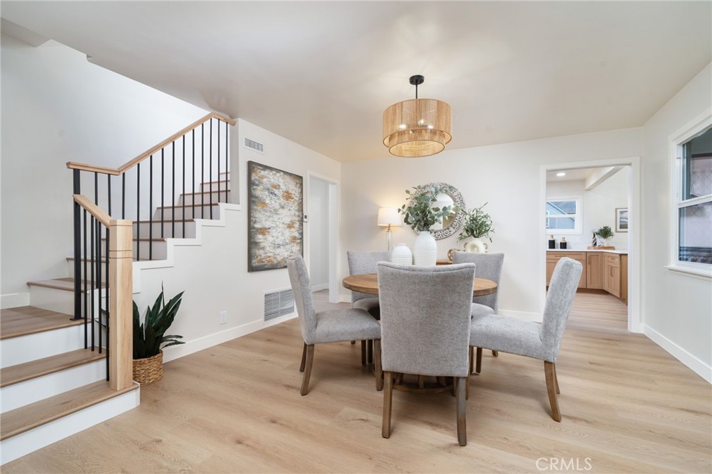 838 East Ada Avenue Glendora, CA 91741 - Photo 11 of 48 a view of a dining room with furniture window and wooden floor
