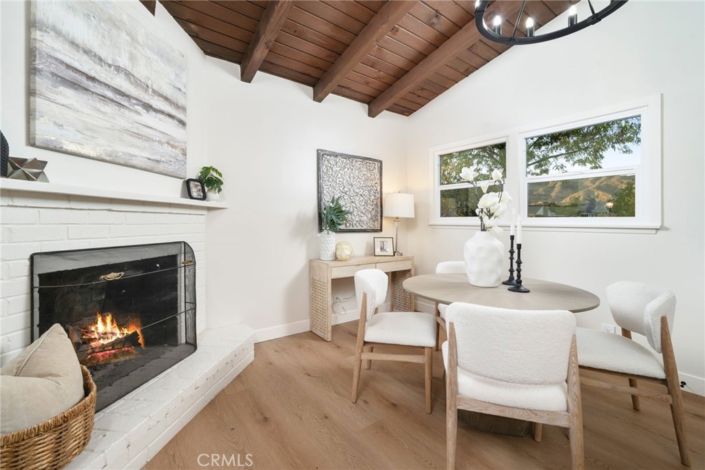 838 East Ada Avenue Glendora, CA 91741 - Photo 13 of 48 a living room with furniture a fireplace and a table
