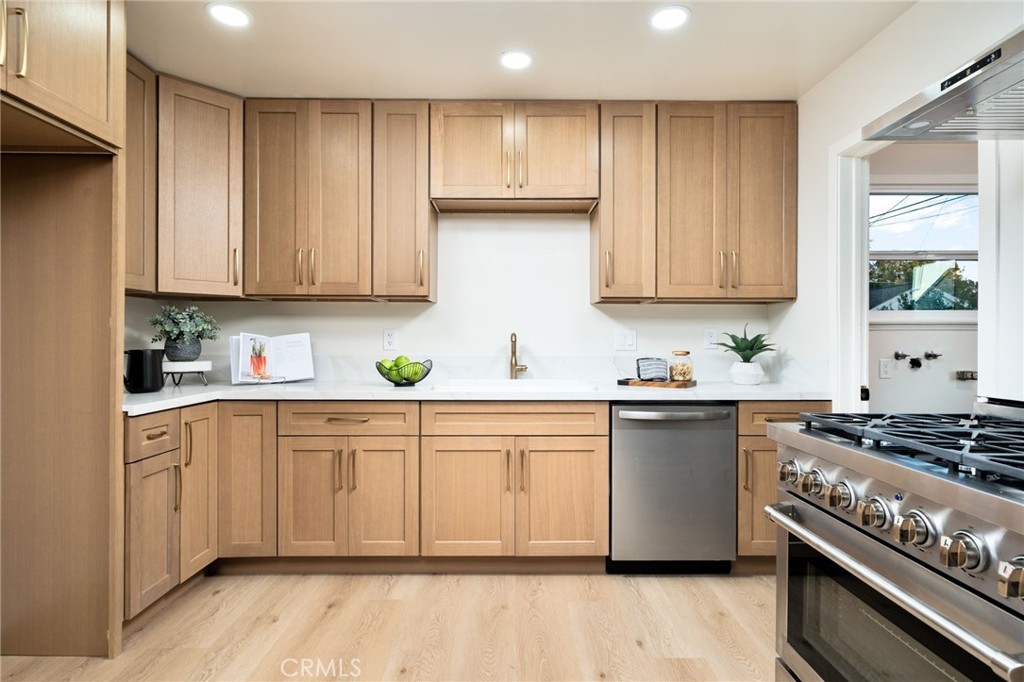 838 East Ada Avenue Glendora, CA 91741 - Photo 16 of 48 a kitchen with granite countertop cabinets and white appliances