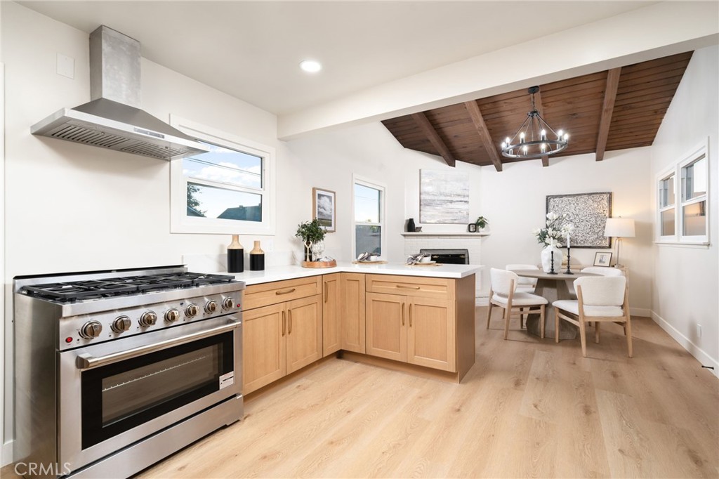 838 East Ada Avenue Glendora, CA 91741 - Photo 17 of 48 a kitchen with granite countertop stainless steel appliances a stove top oven and cabinets