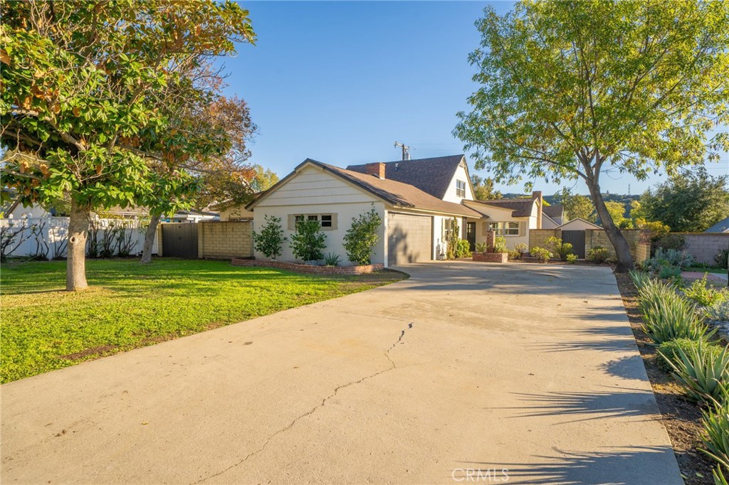 838 East Ada Avenue Glendora, CA 91741 - Photo 2 of 48 a front view of a house with garden