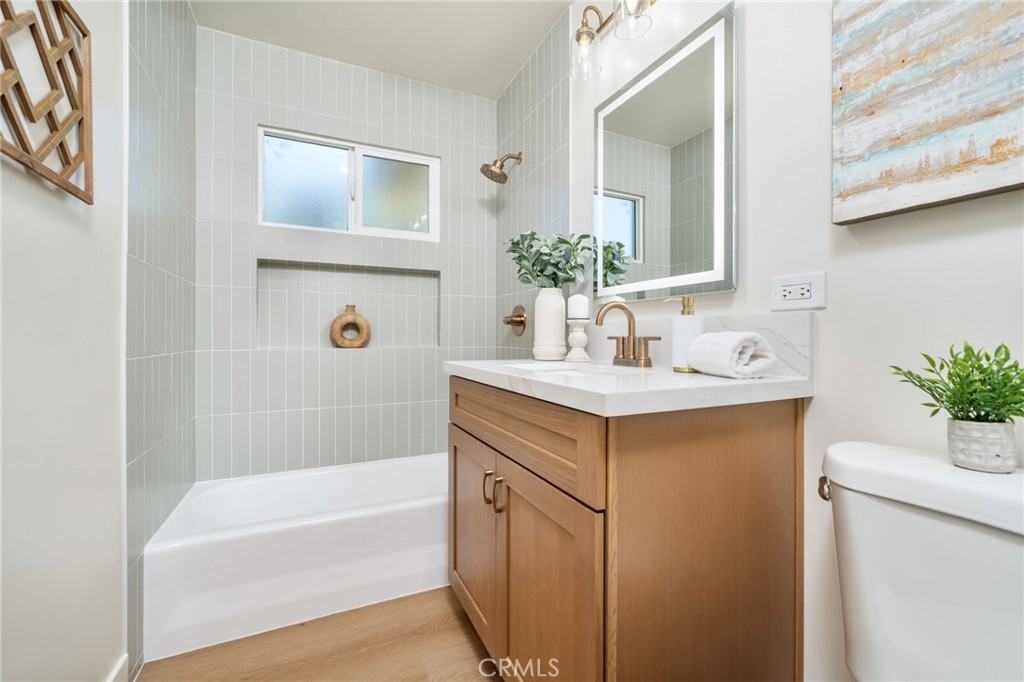 838 East Ada Avenue Glendora, CA 91741 - Photo 21 of 48 a bathroom with a sink and a bathtub