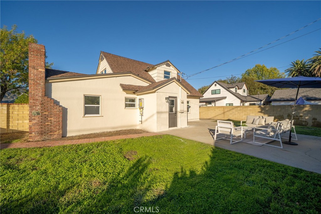 838 East Ada Avenue Glendora, CA 91741 - Photo 28 of 48 a view of a house with a yard and sitting area