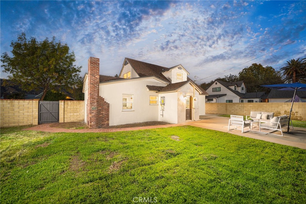 838 East Ada Avenue Glendora, CA 91741 - Photo 30 of 48 a view of a house with a yard and sitting area