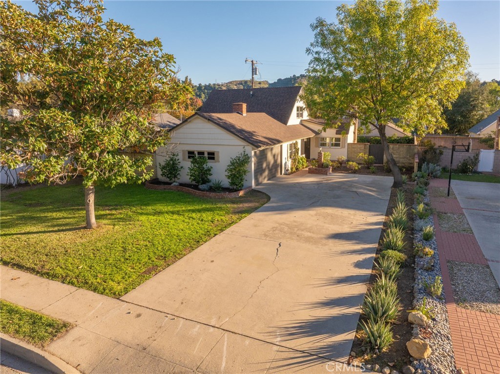 838 East Ada Avenue Glendora, CA 91741 - Photo 35 of 48 a front view of a house with garden