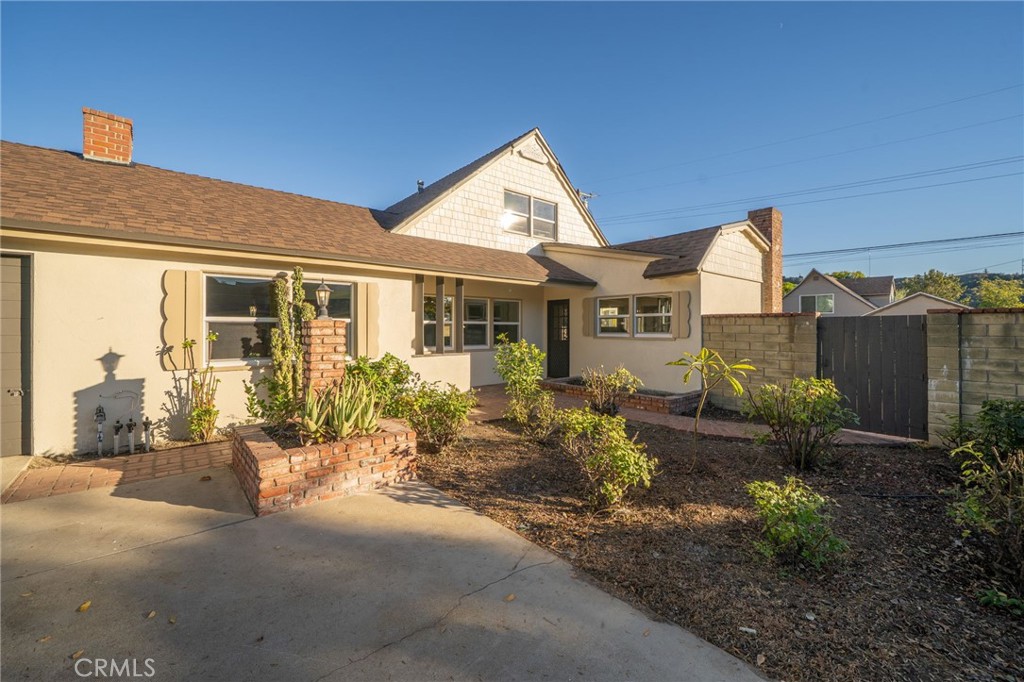 838 East Ada Avenue Glendora, CA 91741 - Photo 4 of 48 a view of a house with a yard