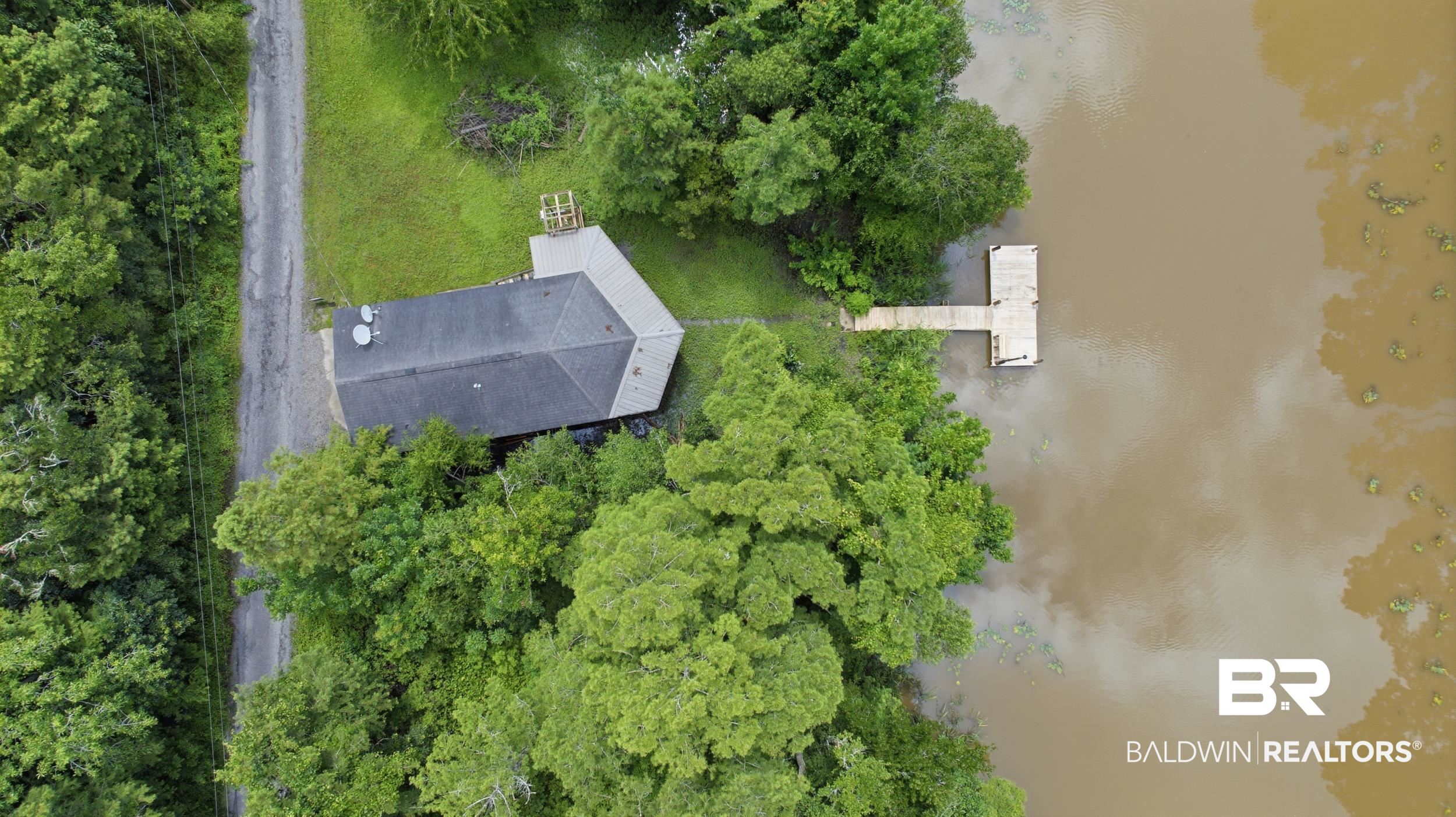 42080 Bayou Road Bay Minette, AL 36507 - Photo 30 of 43 Rooftop structure with dark shingle roofing