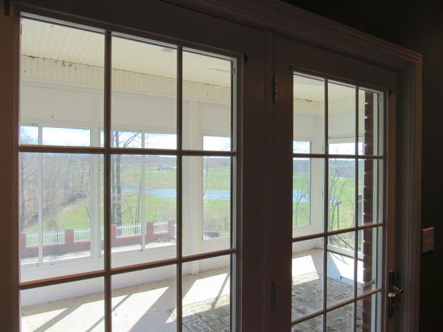 408 Witcher Hollow Road Red Boiling Springs, TN 37150 - Photo 5 of 18 French doors lead from the master bedroomonto a relaxing sun deck. Note the view to the back!