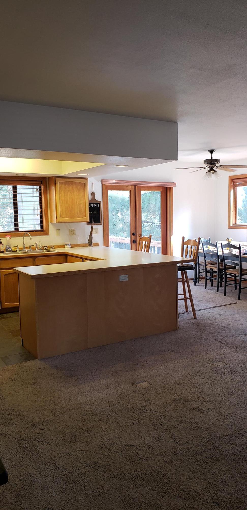 18892 Choctaw Road Bend, OR 97702 - Photo 8 of 26 kitchen io open to dining area and living room