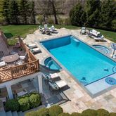 a picture of a table and chairs in the patio