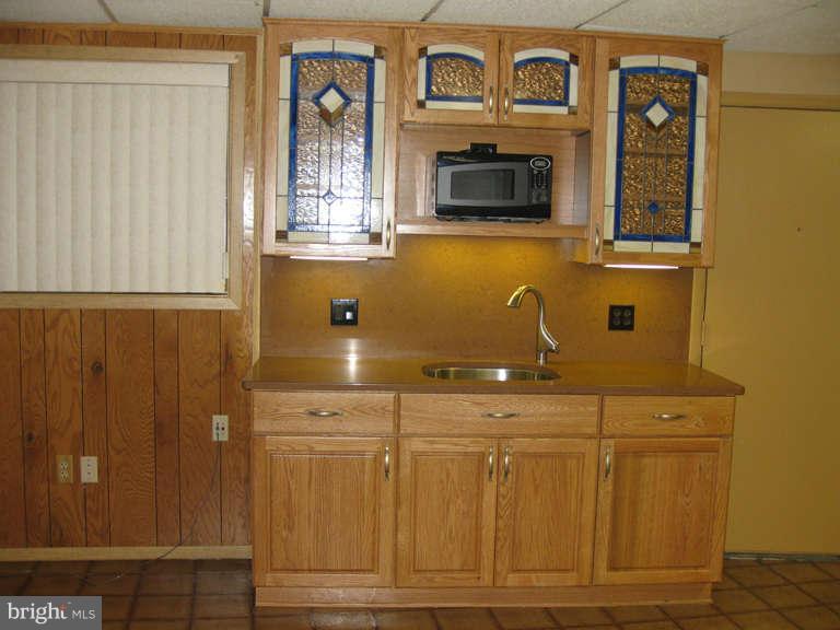 2117 Sondra Court Silver Spring, MD 20905 - Photo 27 of 30 Lower Level Kitchenette Cabinets