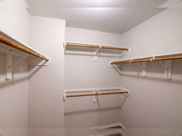 a view of a room with racks on the wall