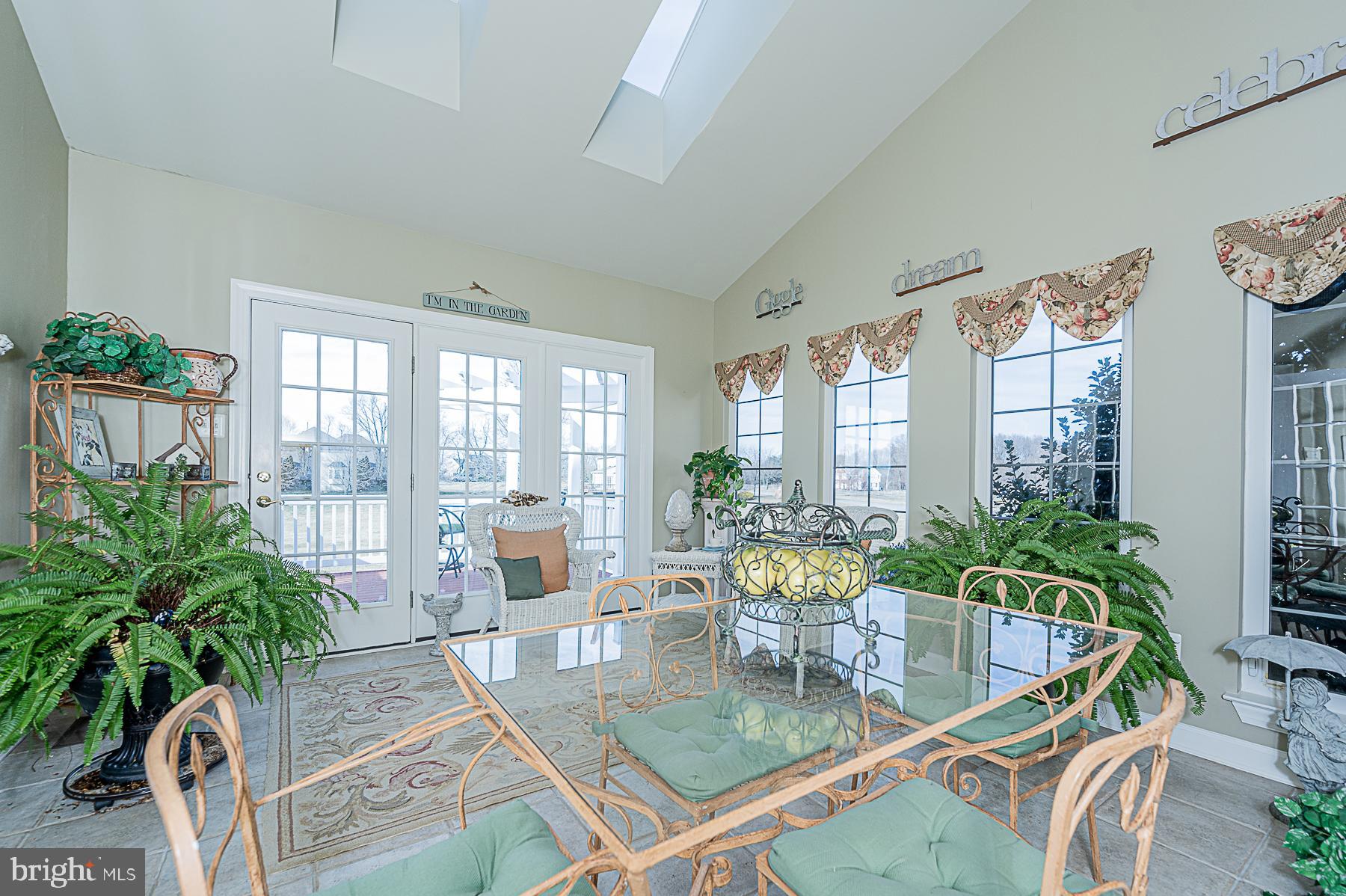 12004 Open Run Road Ellicott City, MD 21042 - Photo 21 of 68 Solarium with skylights and vaulted ceiling