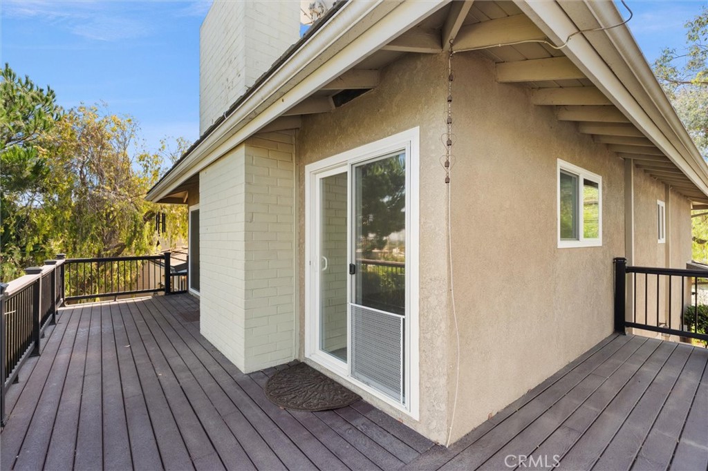 6301 East Bixby Hill Road Long Beach, CA 90815 - Photo 23 of 48 a view of a house with wooden floor