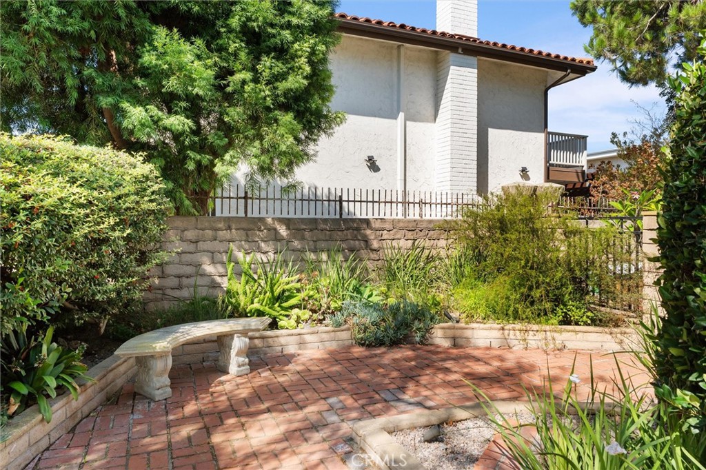 6301 East Bixby Hill Road Long Beach, CA 90815 - Photo 27 of 48 a house with a yard