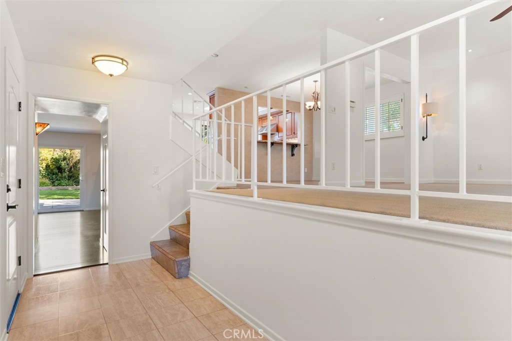 6301 East Bixby Hill Road Long Beach, CA 90815 - Photo 6 of 48 a view of entryway with wooden floor and door