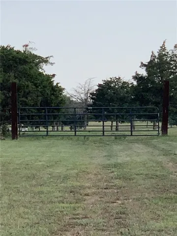 a view of outdoor space with deck and trees