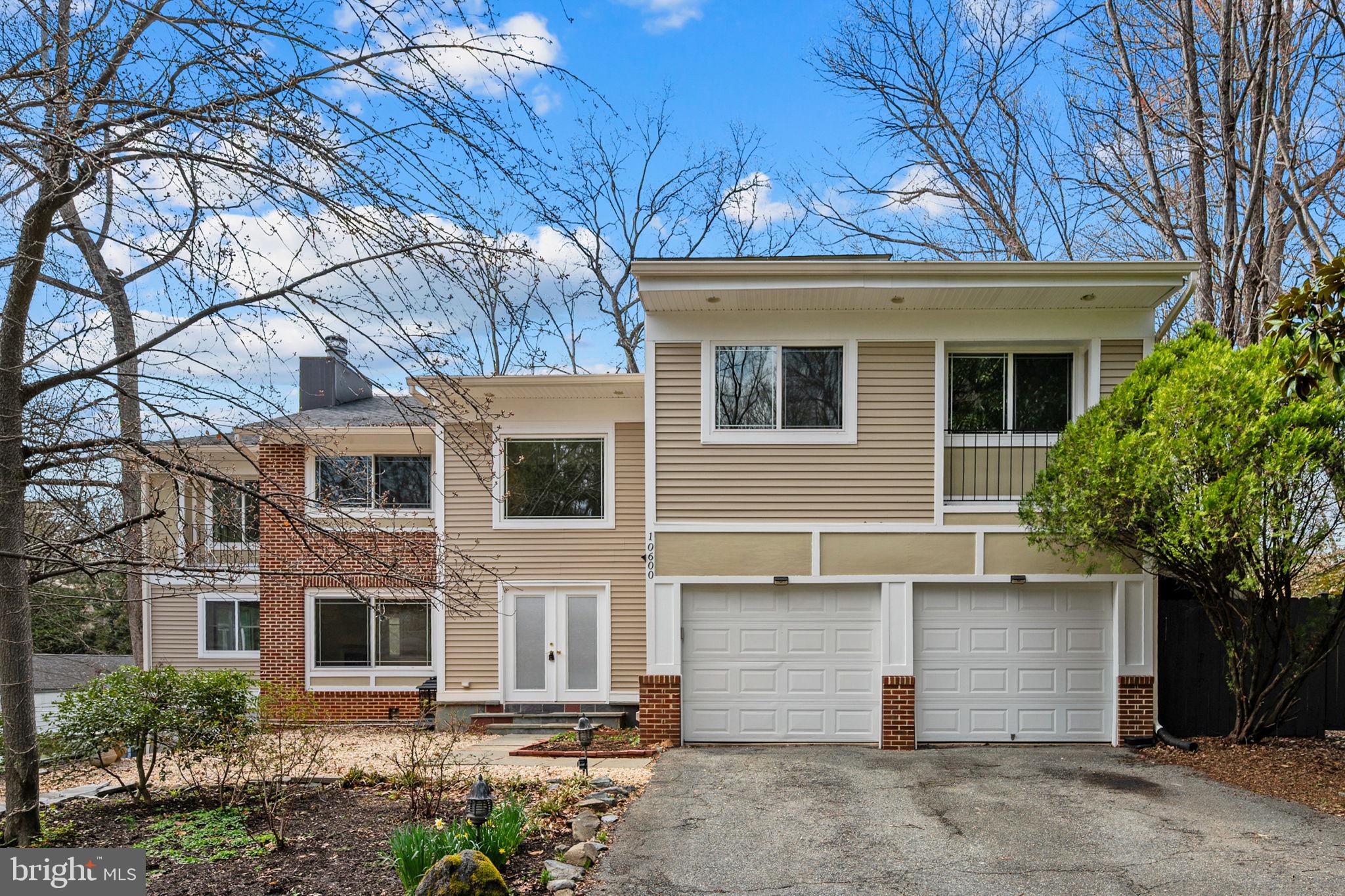 10600 Vantage Court Potomac, MD 20854 - Photo 84 of 91 a front view of a house with a yard