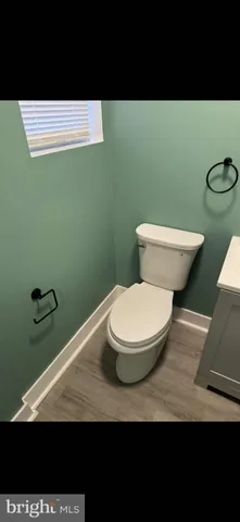 a view of a kitchen from the hallway