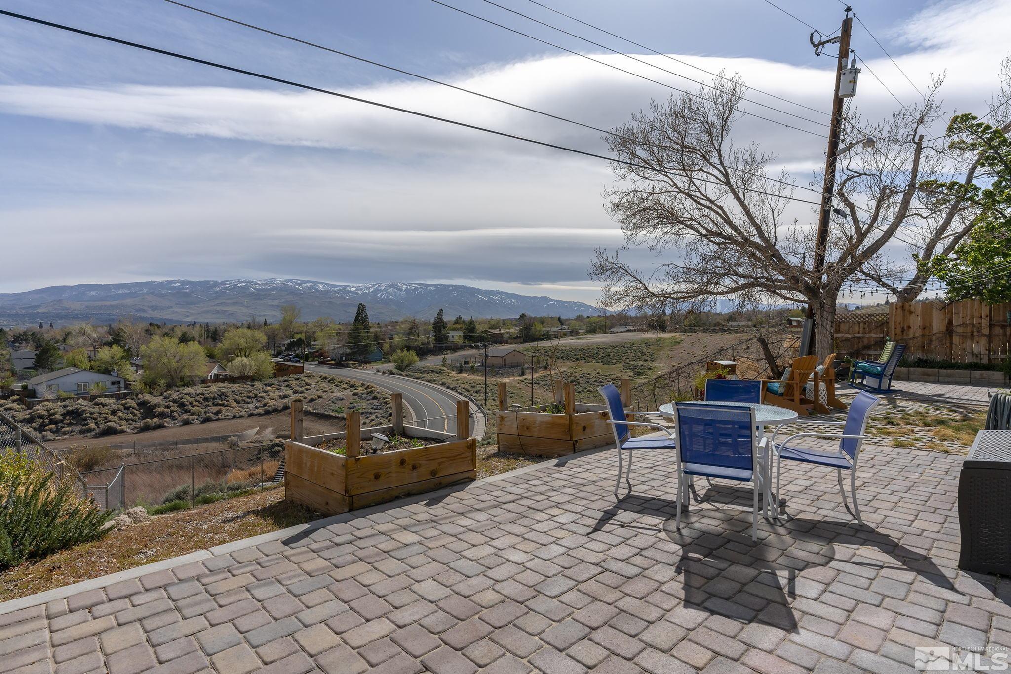 2660 Polk Street Reno, NV 89503 - Photo 24 of 40 a terrace with a bench and trees