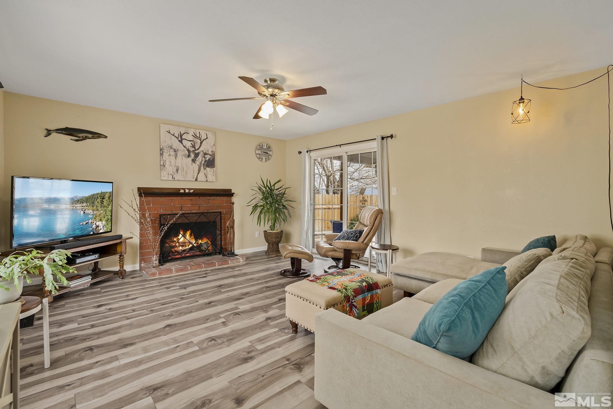 2660 Polk Street Reno, NV 89503 - Photo 8 of 40 a living room with furniture and a fireplace
