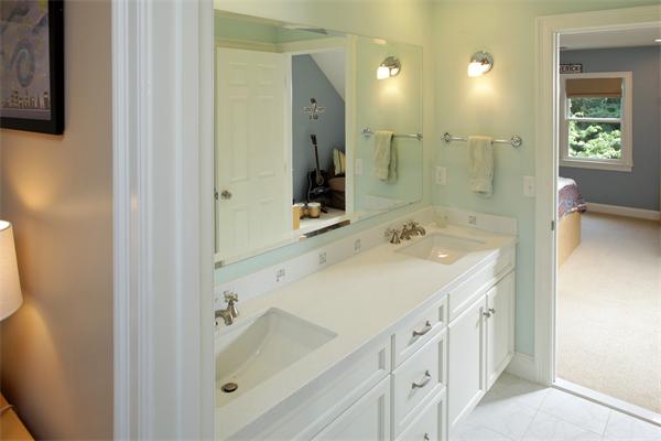 10 Baker Hill Drive Hingham, MA 02043 - Photo 16 of 21 a bathroom with a sink a mirror and a shower