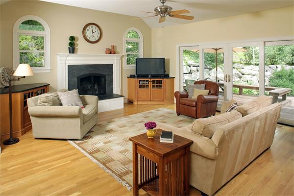 10 Baker Hill Drive Hingham, MA 02043 - Photo 2 of 21 a living room with furniture a fireplace and a floor to ceiling window
