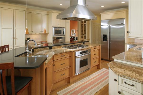 10 Baker Hill Drive Hingham, MA 02043 - Photo 6 of 21 a kitchen with stainless steel appliances granite countertop a sink a stove and a refrigerator