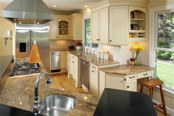 10 Baker Hill Drive Hingham, MA 02043 - Photo 8 of 21 a kitchen with stainless steel appliances granite countertop a sink stove and refrigerator