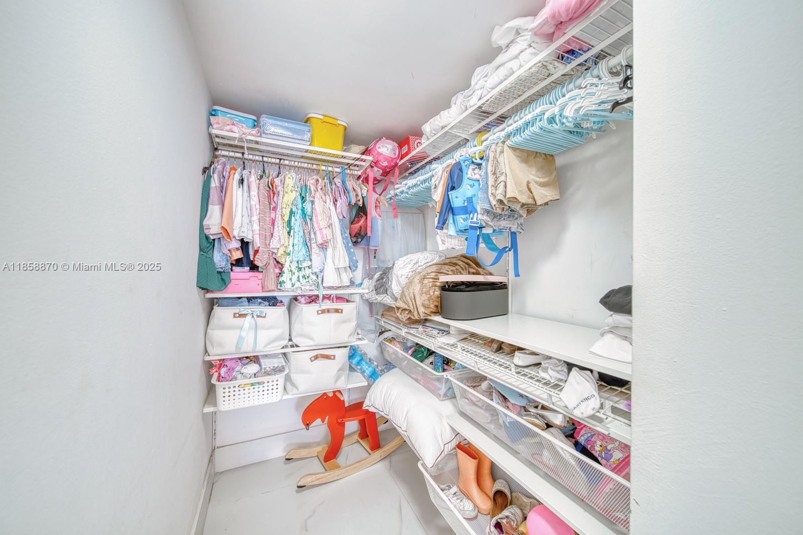 7601 East Treasure Drive, Unit 2424 North Bay Village, FL 33141 - Photo 17 of 25 a utility room with dryer and washer