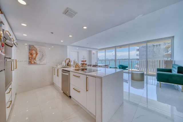 a kitchen with a sink and counter top space