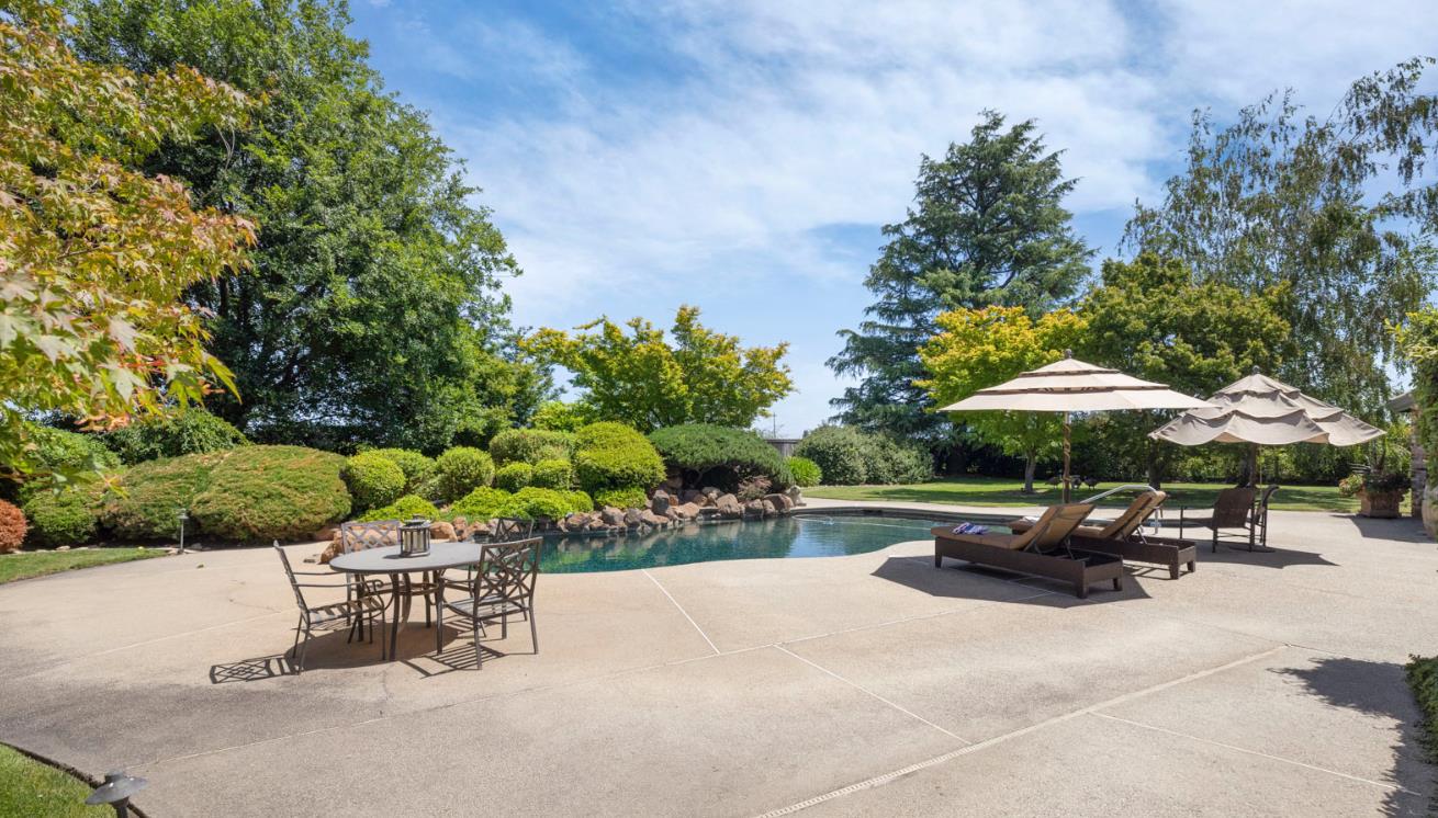 7583 East Realty Road Lodi, CA 95240 - Photo 8 of 41 The resort-like feeling of the backyard.